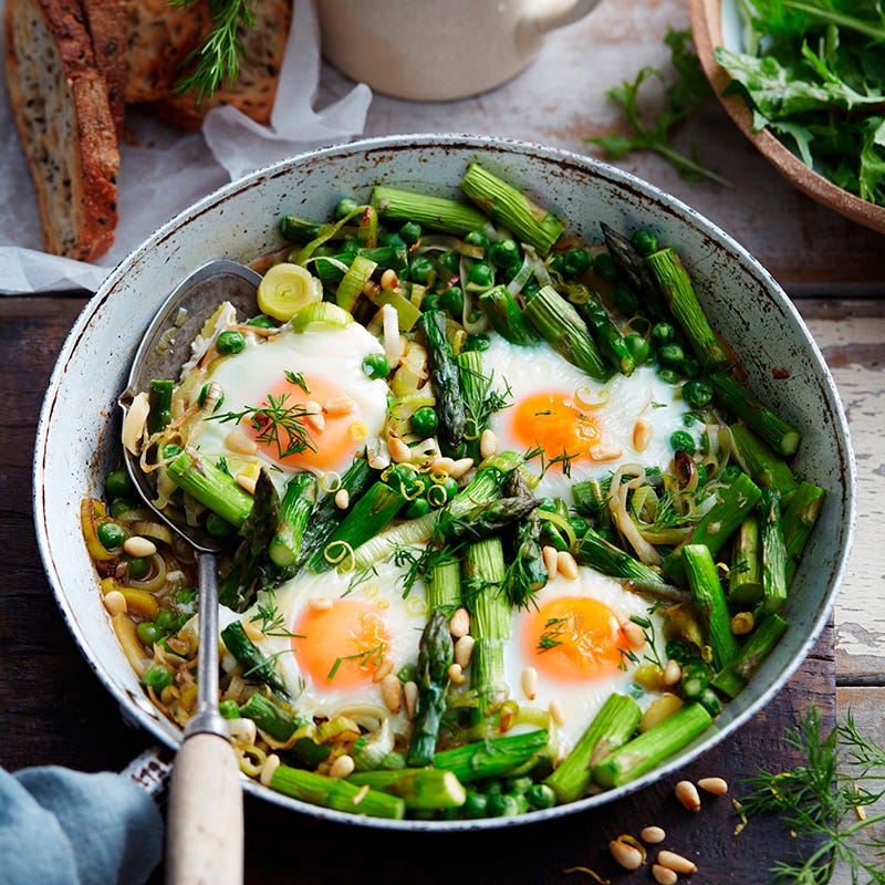 Photo of Baked eggs with asparagus and peas by WW