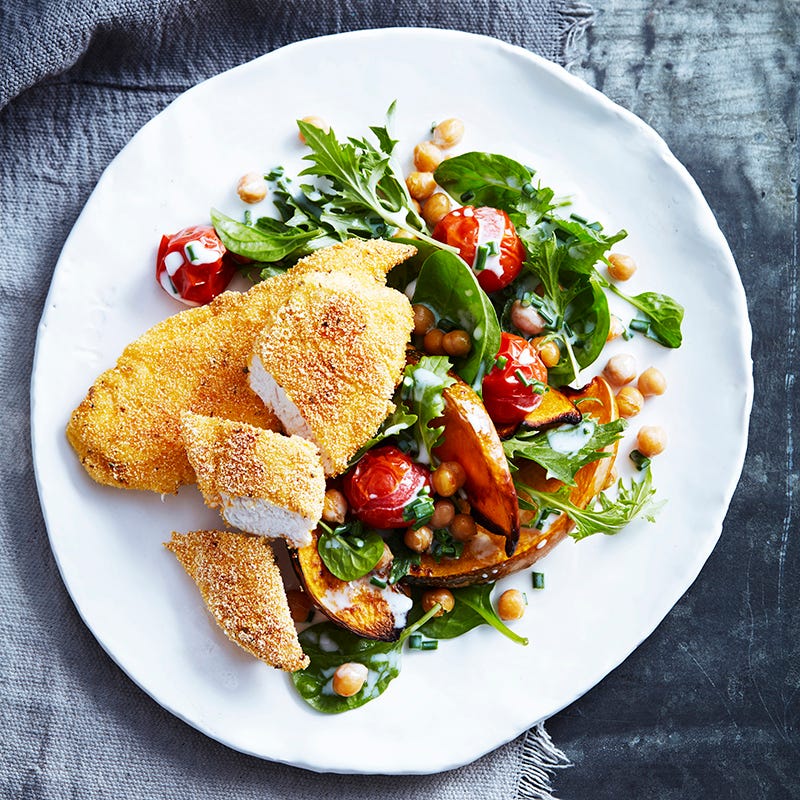 Photo of Spiced polenta chicken tenders with roasted pumpkin and chickpea salad by WW