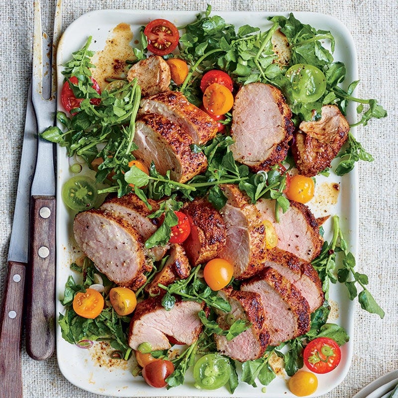 Spice-crusted roast pork fillet with salad